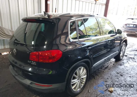 2014 Volkswagen Tiguan Sel z USA, uszkodzony, nr VIN WVGBV3AX0EW556316